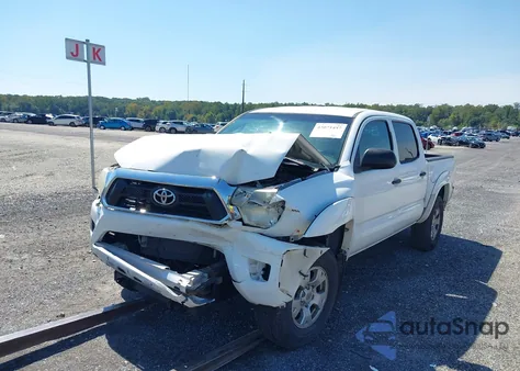 2014 Toyota Tacoma Base V6 z USA, uszkodzony, nr VIN 3TMLU4EN5EM149635